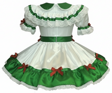 White dress with green and red accents on a white background