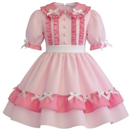 Pink dress with white accents on a white background