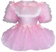 Pink dress with ruffles and bows on a white background