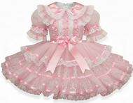 Pink lace and chiffon sissy dress with ruffles and a bow on a white background