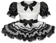 Black and white sissy dress with puffed sleeves and lace skirt on a white background