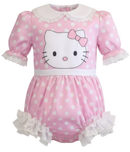Pink polka dot adult romper with Hello Kitty face on a white background