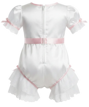 White satin adult baby romper with short puff sleeves, delicate pink ribbon bows, a pink waistband, and a ruffled lace hem, shown from the back on a white background.