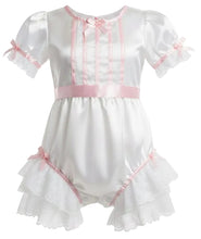 White satin adult baby romper with pink ribbon trim, short puff sleeves, lace ruffles, and a bow detail on the chest.