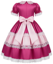 A pink and magenta Lolita-style dress with short puff sleeves, white lace trim, a large bow at the waist, and a tiered skirt, shown on a plain white background.