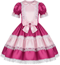 A pink and magenta Lolita-style dress with short puff sleeves, white lace trim, a large bow at the waist, and a tiered skirt, shown on a plain white background.