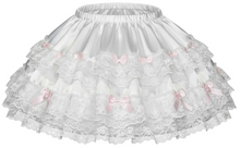 A white satin skirt made of layered satin and lace, featuring a gathered waistband and multiple tiers of floral lace trim.