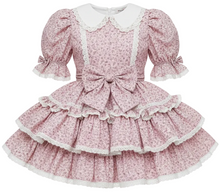 Floral sissy dress with white lace details on a white background