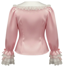 A pink satin long-sleeve blouse with a ruffled lace collar and matching ruffled lace cuffs, displayed on a white mannequin torso against a white background.