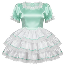 Mint green top and white skirt with ruffles on a white background