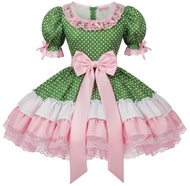 Green polka dot dress with pink ruffles and bow on a white background