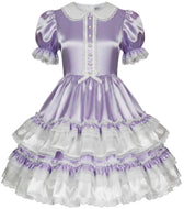 A lavender and white Lolita-style dress with a shiny satin-like finish, featuring a white collar, lace trim, ruffled sleeves, and a tiered skirt with white ruffles and lace details.