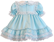 A mint green adult baby dress with white lace trim, ruffled sleeves, and a tiered skirt, shown against a plain white background.
