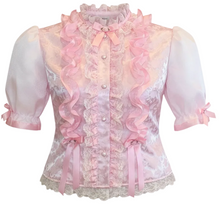 A pink adult sissy ruffled blouse with sheer puff sleeves, lace trim, and decorative bows, shown against a plain white background.