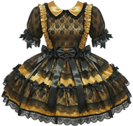 Black and gold dress with lace details on a white background