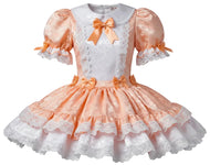 A peach and white brocade sissy dress