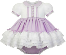 A sissy baby girl's short-sleeve dress with a white bodice, lavender collar and skirt, and white lace trim, shown on a plain white background.
