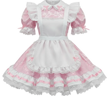 Pink and white dress with ruffles and a bow on a white background
