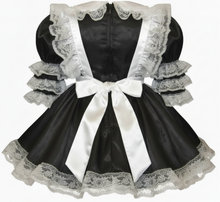 Black maid dress with white lace and a bow on a white background