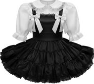 Black ruffled dress with white lace collar and sleeves on a white background