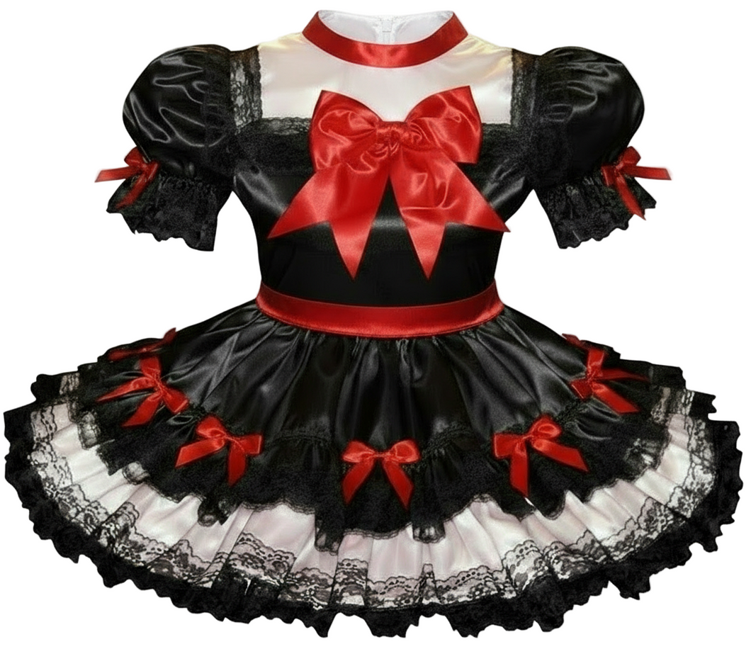 Black and red dress with a large bow on a white background