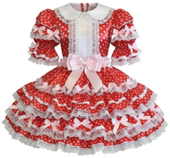 Red polka dot sissy dress with white ruffles and bows on a white background