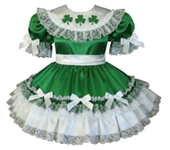 Green dress with white lace and shamrock designs on a white background