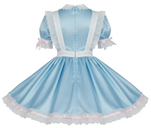 Light blue dress with white and pink accents on a white background