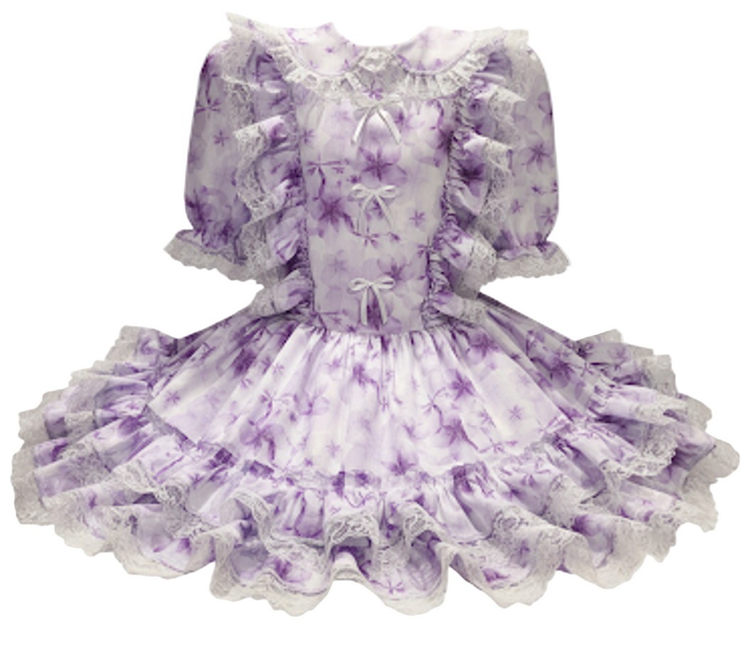 Purple and white floral dress with ruffles on a white background