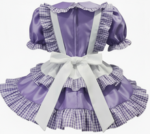 Purple and white checkered apron with ruffled details on a white background
