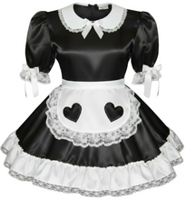 Black and white maid costume with heart designs on a white background