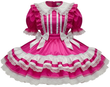 Fuchsia satin dress with white ruffles and bows on a white background