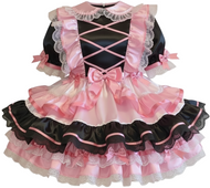 Black and pink dress with ruffles and bows on a white background