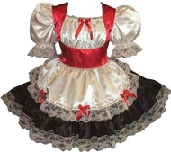 A satin Swiss maid dress featuring a white and red color scheme with lace and satin ribbon details, an attached front apron, elasticized sleeve ends, and a full gathered skirt with lace-edged ruffles.